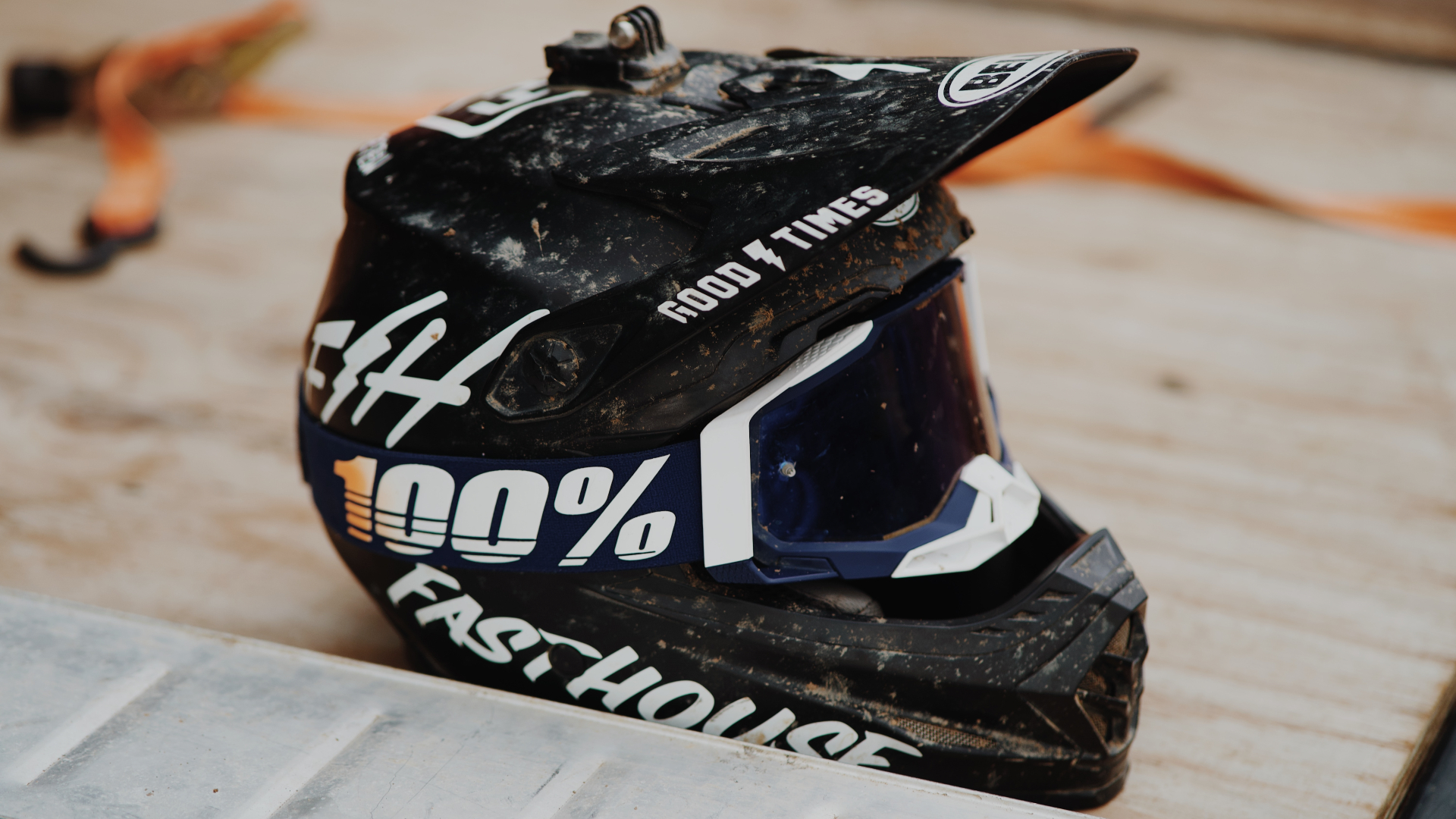 Muddy Bell Motocross Helmet sitting on the ground